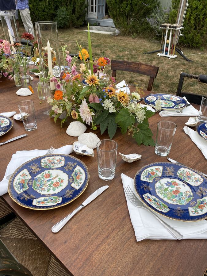 Blue and white plates, dahlias, outdoor