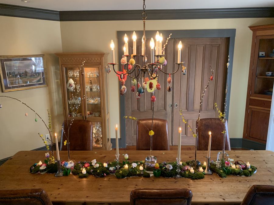 Easter dining room, long table, moss and eggs, chandelier