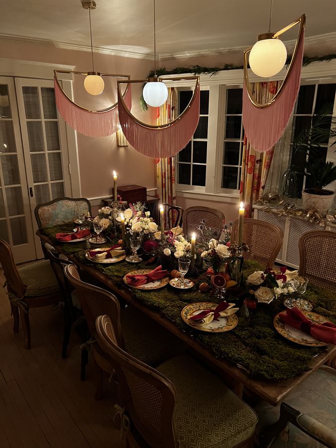 Christmas table with candles, warm light