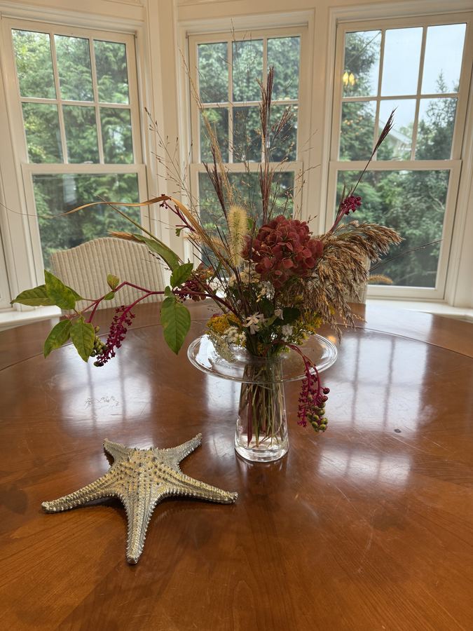 Fall arrangement with starfish on dining table