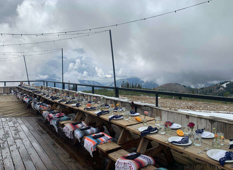 The Well, Powder Mountain: deck table under storm clouds