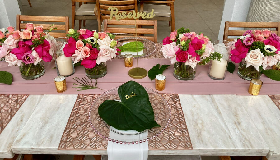 Miami: pink roses runner, monstera place cards, reserved sign